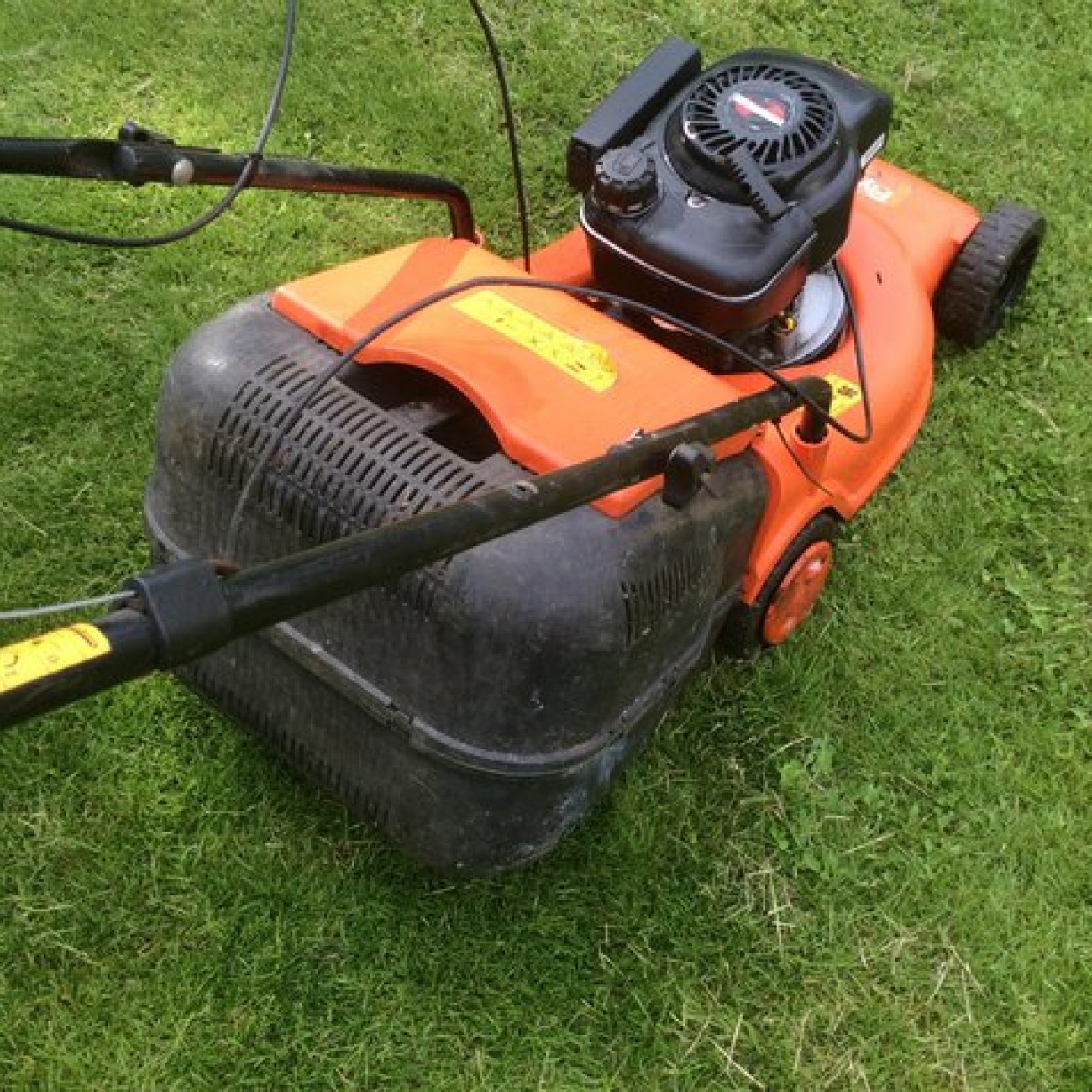 Petrol self propelled lawnmower