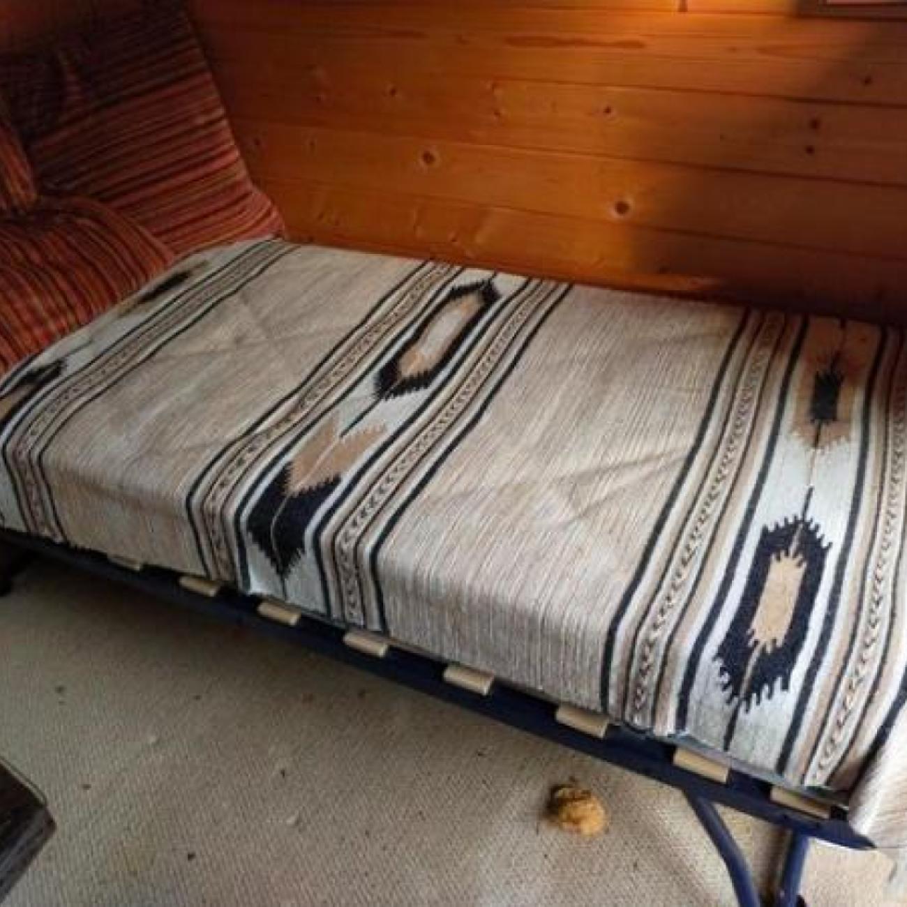 Single fold away bed with mattress