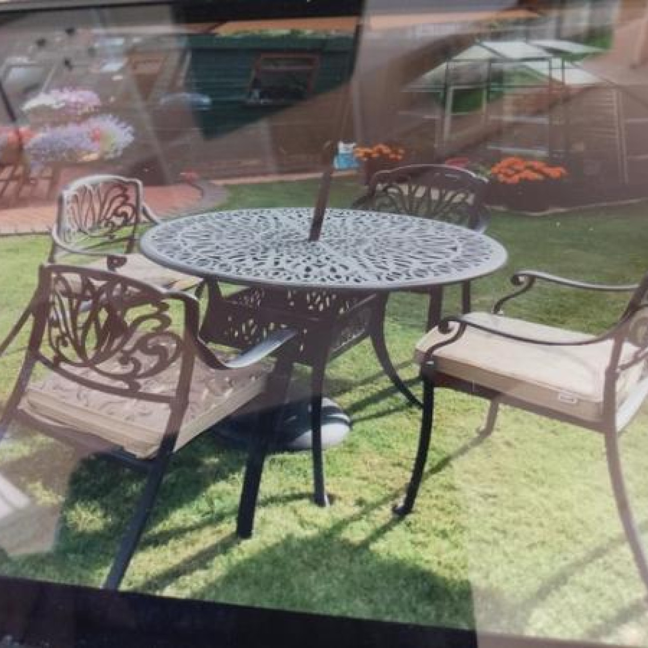 Garden table, chairs and parasol
