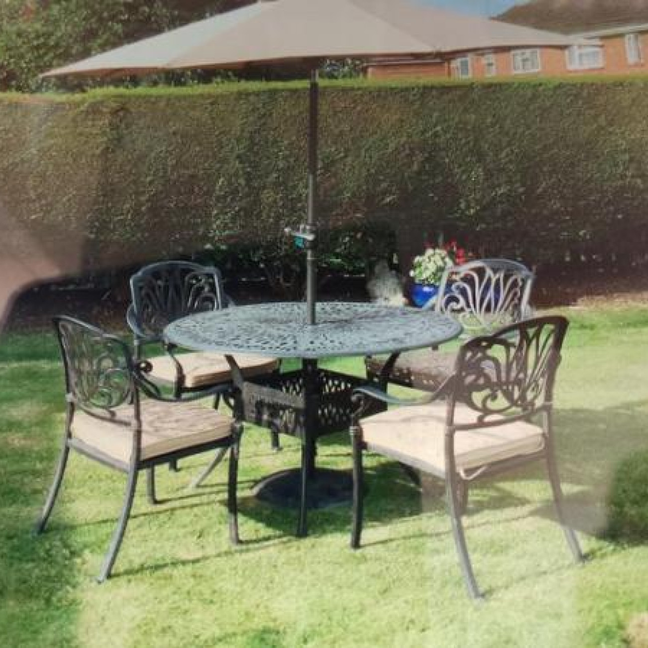 Garden table, chairs and parasol