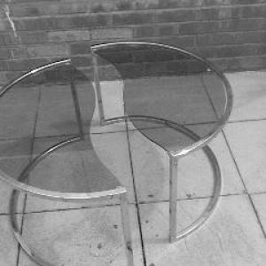 A Circular metal and glass coffee table