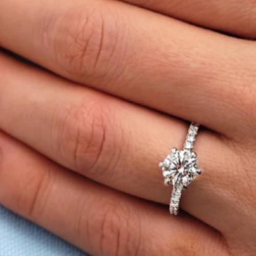 Elegant Symbolism in a Modern Round Engagement Ring Design