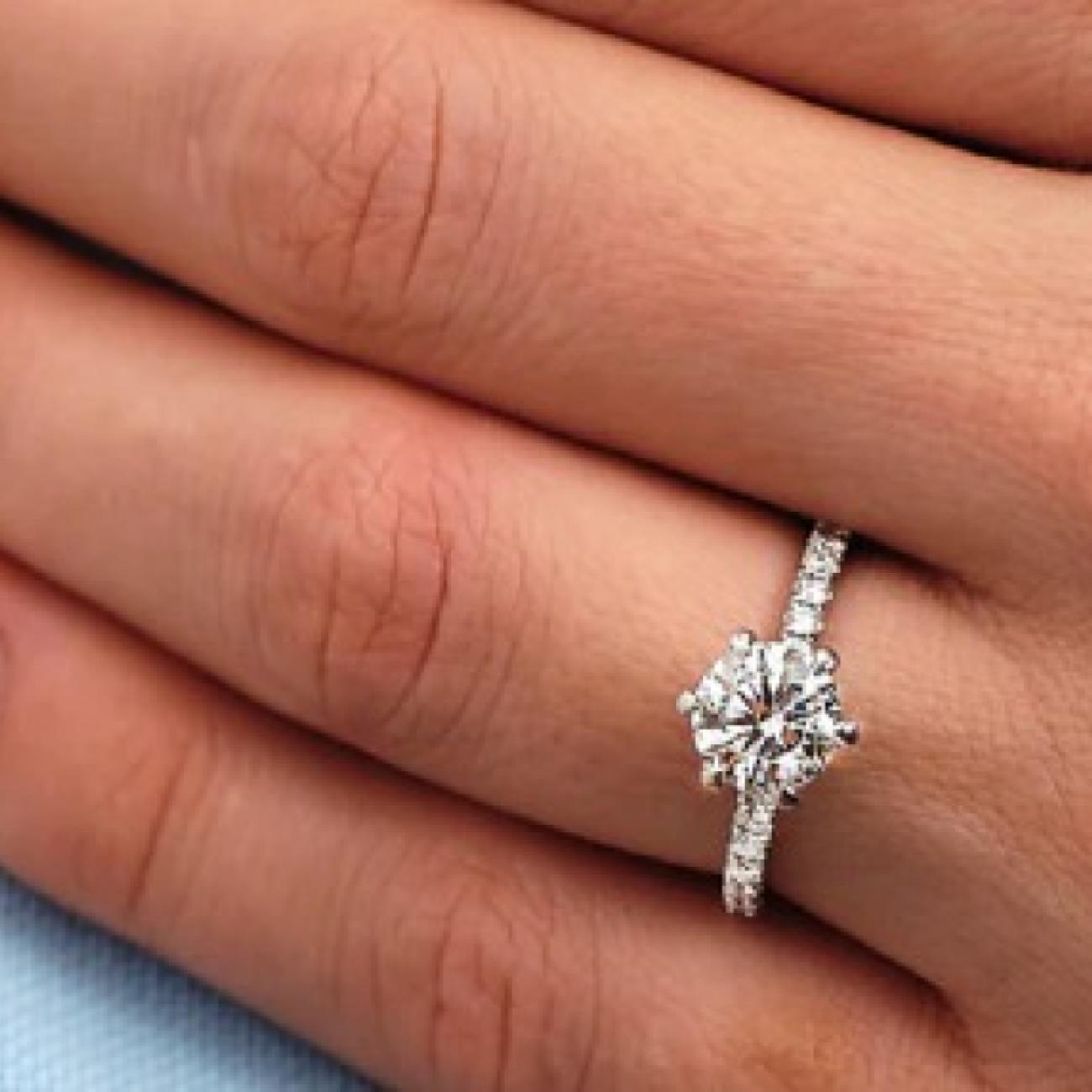 Elegant Symbolism in a Modern Round Engagement Ring Design