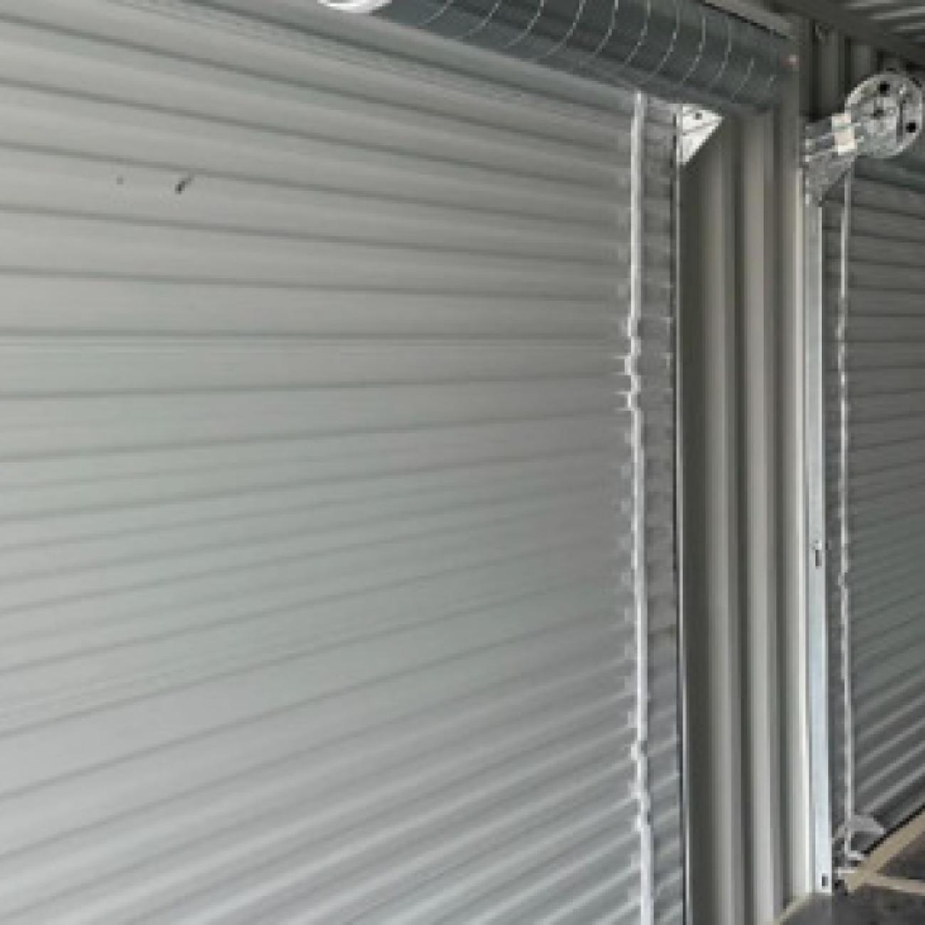 20ft Shipping Container with a Roll-Up Door.