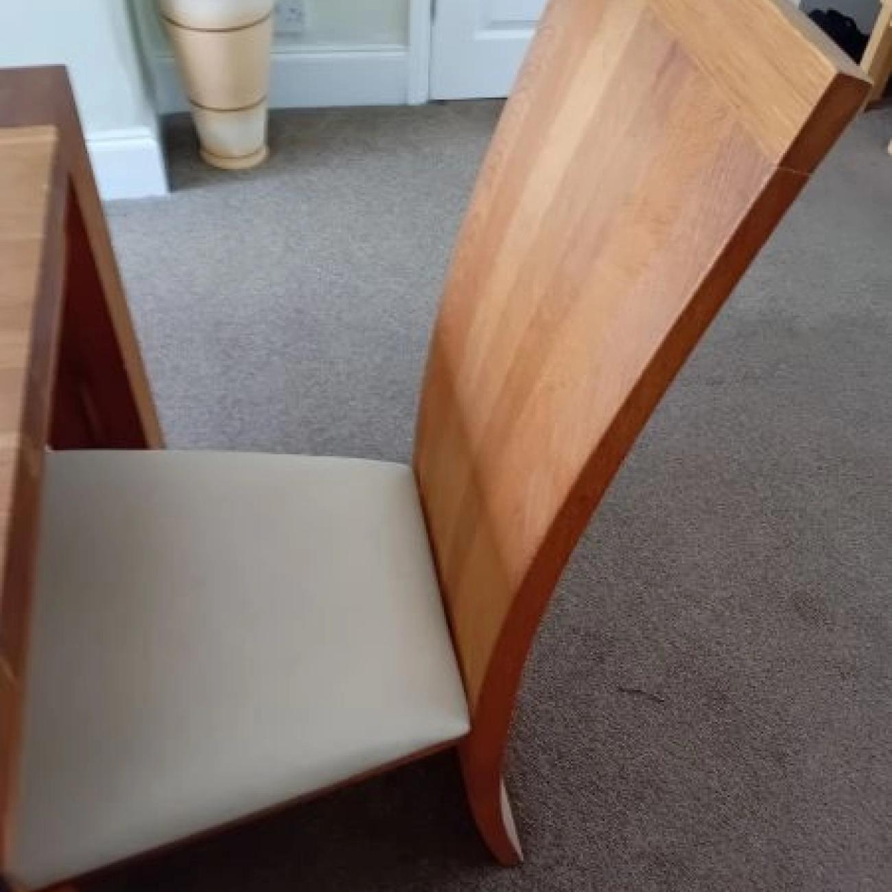 Faux leather upright chairs