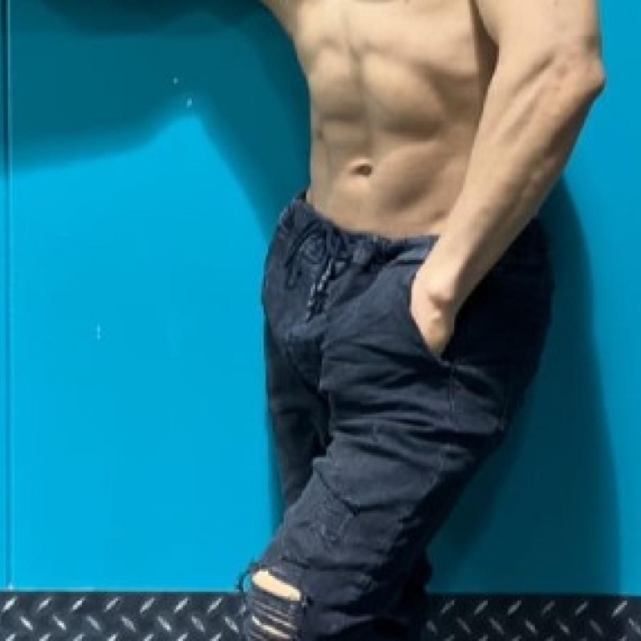 Muscular bisexual male