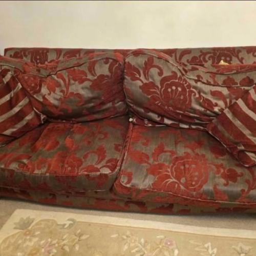 SCS BURGUNDY SOFA plus white Chinese rug
