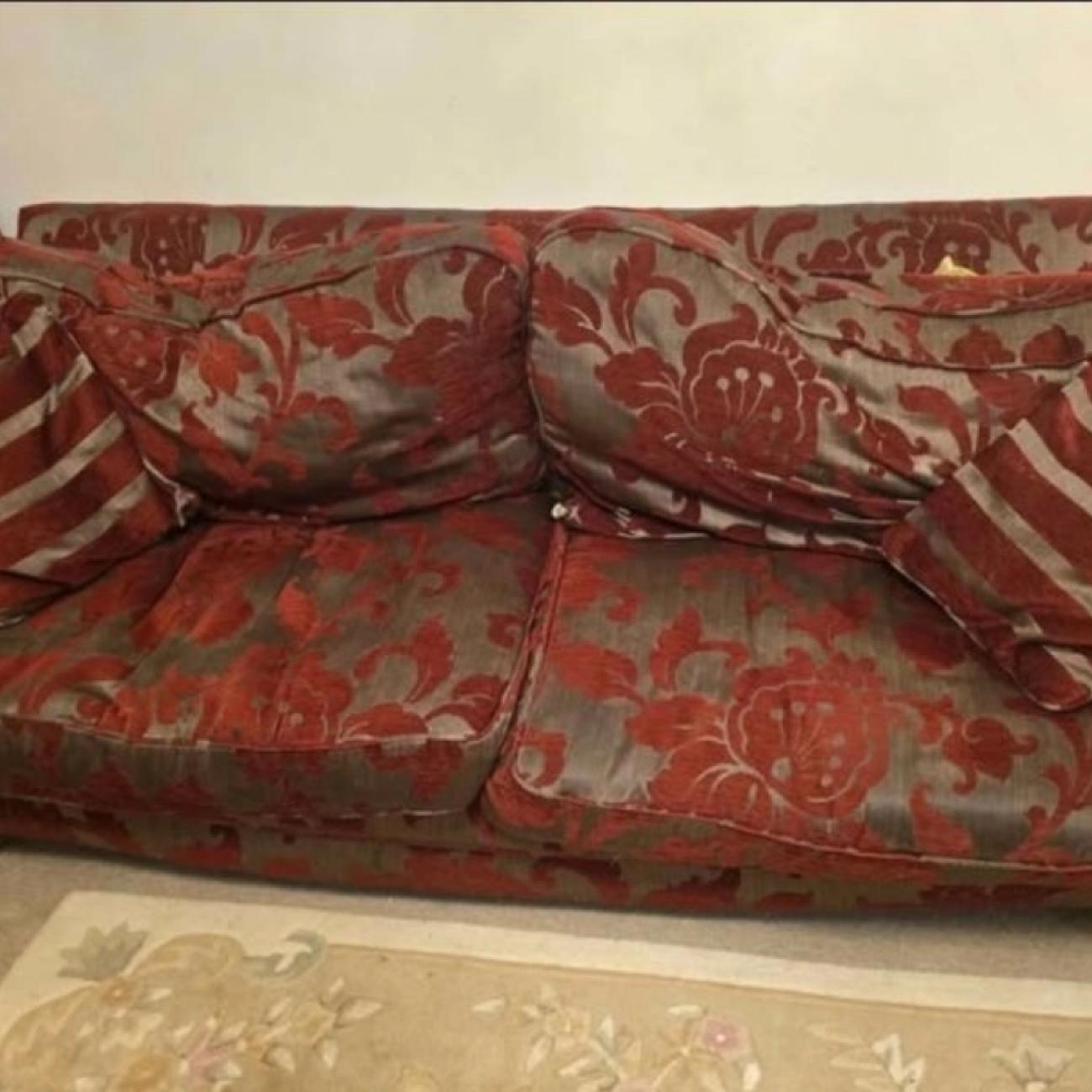 SCS BURGUNDY SOFA plus white Chinese rug