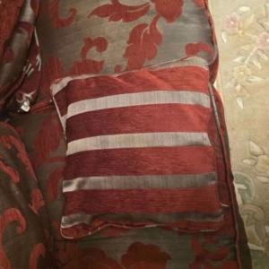 SCS BURGUNDY SOFA plus white Chinese rug