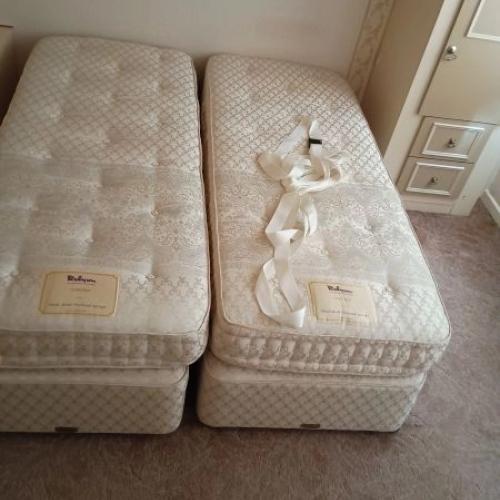 Two single beds that can make into a double