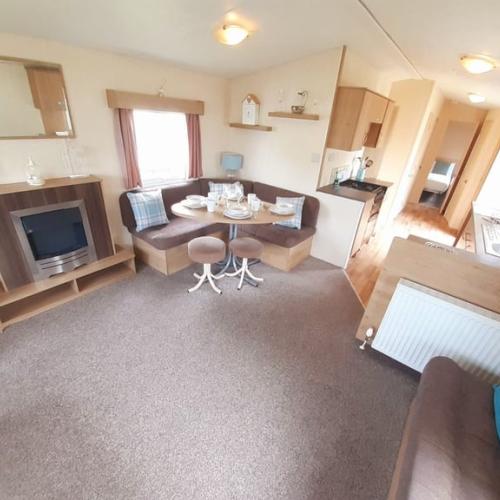 Own this 3 bedroom static caravan in hastings, 11.5 month use
