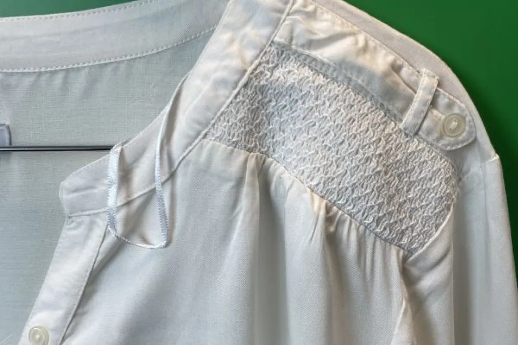 Ivory v neck blouse
