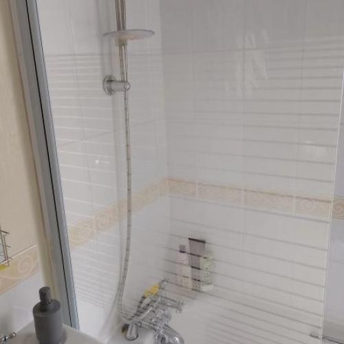 GLASS SHOWER SCREEN AND MIXER TAPS
