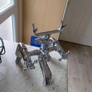 GLASS SHOWER SCREEN AND MIXER TAPS