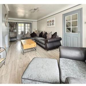 L shaped sofa and chair also storage footstool