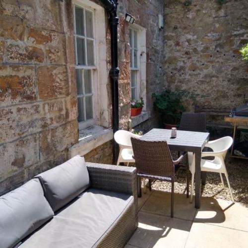 Large main door Georgian flat with private suntrap terrace in Trinity