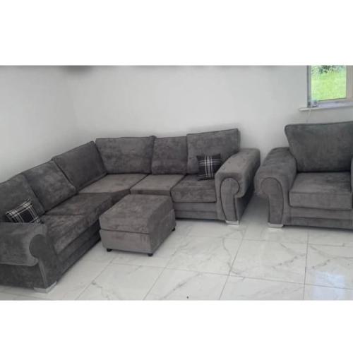 Brand new 2c2 sofa and footstool