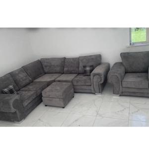 Brand new 2c2 sofa and footstool