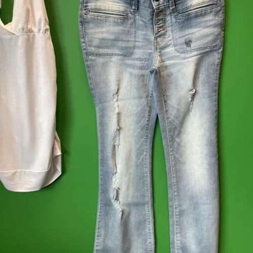 White top and blue jeans
